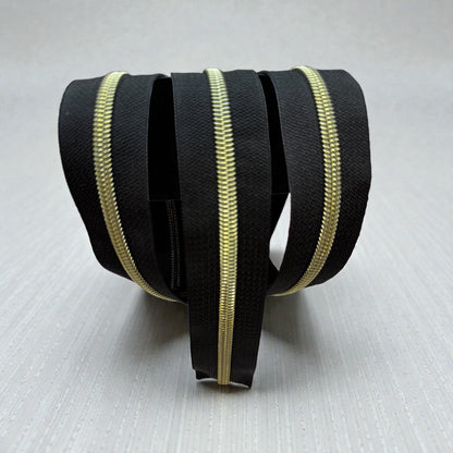 Classic Black #5 Nylon Zipper Tape with Gold Coil (Sold by the Yard)