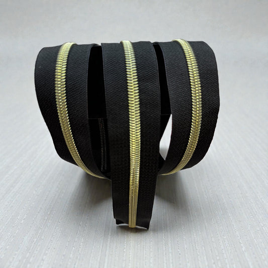 Classic Black #5 Nylon Zipper Tape with Gold Coil (Sold by the Yard)