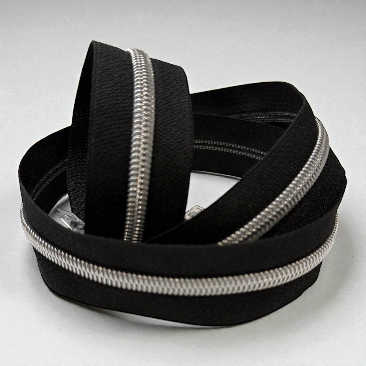 Jet Black #5 Nylon Zipper Tape with Silver Coil (Sold by the Yard)