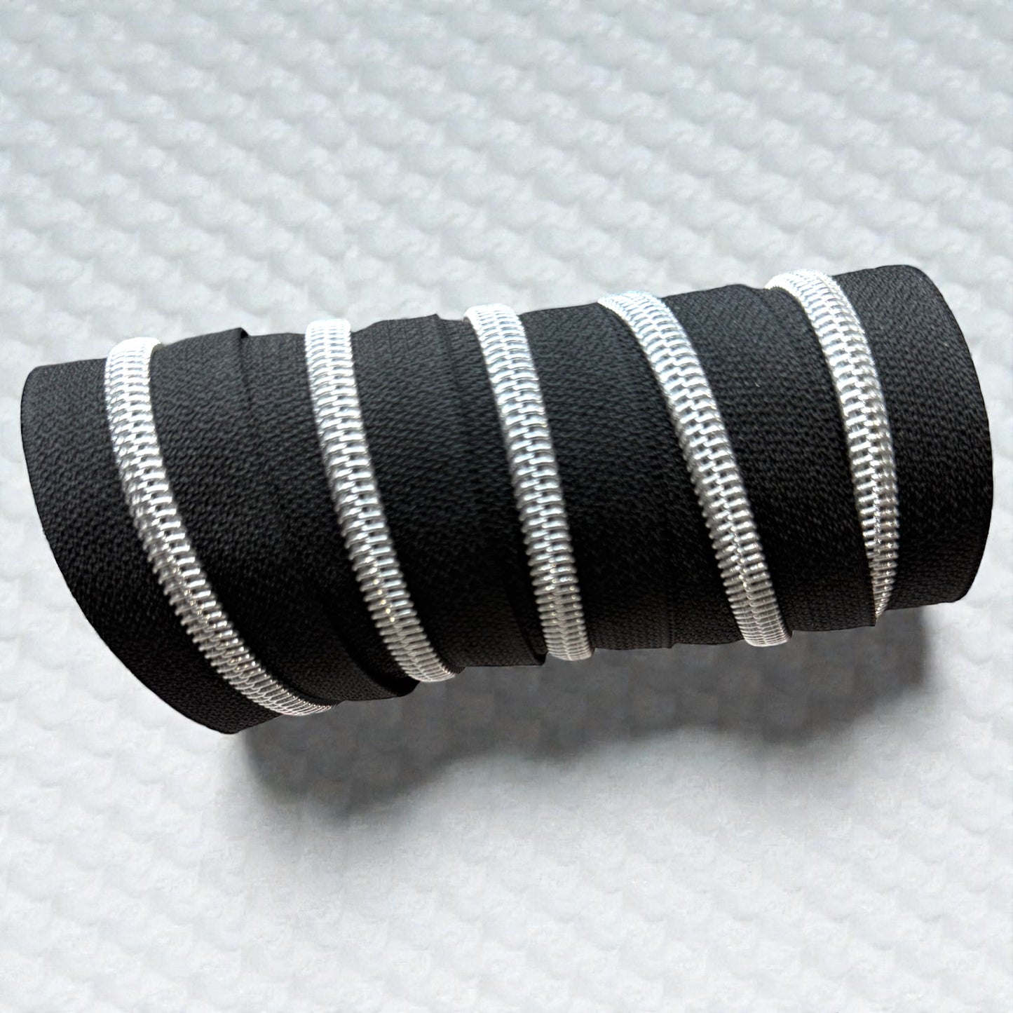 Jet Black #5 Nylon Zipper Tape with Silver Coil (Sold by the Yard)