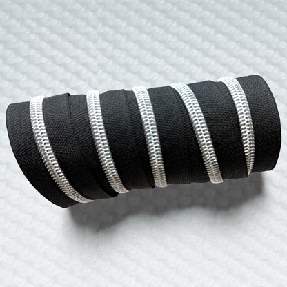 Jet Black #5 Nylon Zipper Tape with Silver Coil (Sold by the Yard)