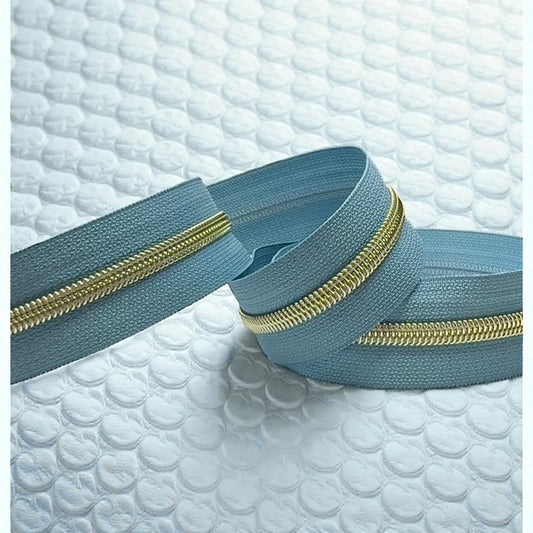 Slate Blue #5 Nylon Zipper Tape with Gold Coil (Sold by the Yard)