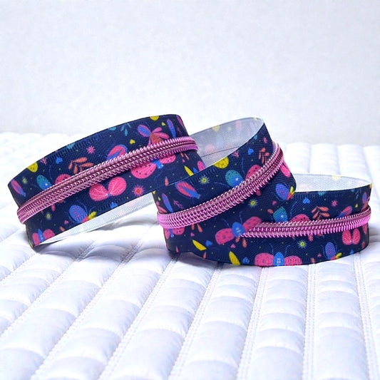 Flutter Navy Butterfly Print #5 Nylon Zipper Tape with Neon Pink/Purple Coil (Sold by the Yard)