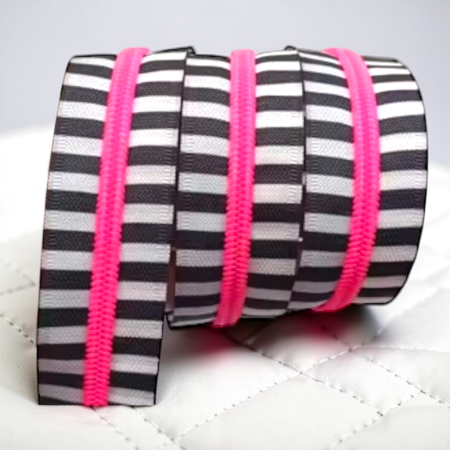 Striped White and Black #5 Nylon Zipper Tape with Hot Pink Teeth – (Sold by the Yard)